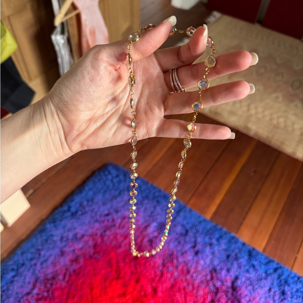 18 inch long clear eyelet and gold necklace